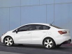 kia-rio_sedan_2012_1024x768_wallpaper_06