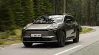 2026_toyotabz4xtouring_awd_brilliantbronzemetallic_dynamic_009