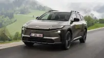 2026_toyotabz4xtouring_awd_brilliantbronzemetallic_dynamic_041