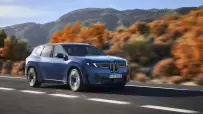 P90615615_highRes_the-new-bmw-ix3-50-x
