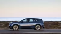 P90615620_highRes_the-new-bmw-ix3-50-x