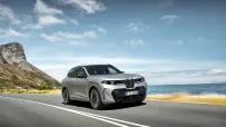 P90646080_highRes_bmw-x5-m60e-xdrive-0