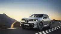 P90646108_highRes_bmw-x5-m60e-xdrive-0