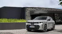 P90646112_highRes_bmw-x5-m60e-xdrive-0