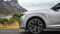 P90646119_highRes_bmw-x5-m60e-xdrive-0