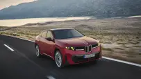 P90655720_highRes_bmw-ix4-m60-xdrive-d