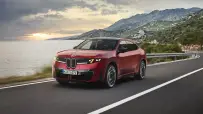 P90655725_highRes_bmw-ix4-m60-xdrive-d