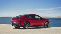 P90655777_highRes_bmw-ix4-m60-xdrive-s