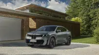 P90655784_highRes_bmw-ix4-50-xdrive-st