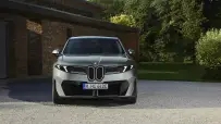 P90655786_highRes_bmw-ix4-50-xdrive-st