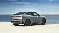 P90655797_highRes_bmw-ix4-50-xdrive-st
