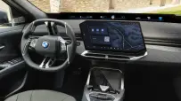 P90655827_highRes_bmw-ix4-50-xdrive-in